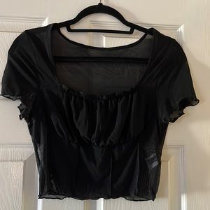 Black mesh crop top with built-in bandau. Size M.
